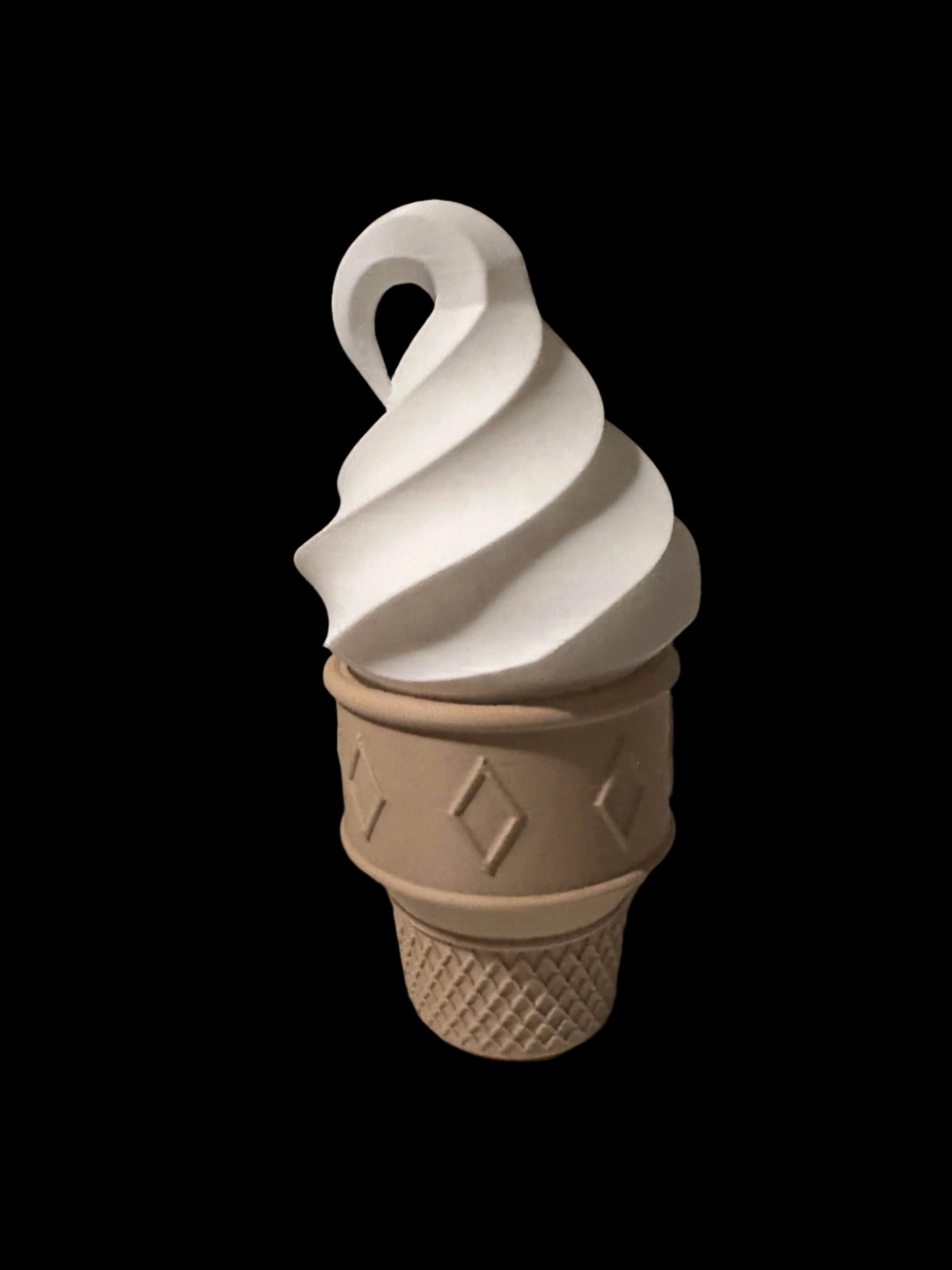 A CONEZ CONE CASE V2 shows a swirl of white soft-serve ice cream atop a textured cone, set against a solid black background that highlights the ice cream and cone.